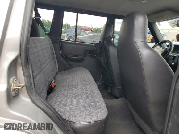2001 Jeep Cherokee Sport with VIN 1J4FF48S91L592966, listed as a Copart auction lot 58996445 with 159,140 mi miles and Salvage title. Bid and sale history available at DreamBid. Image 11.