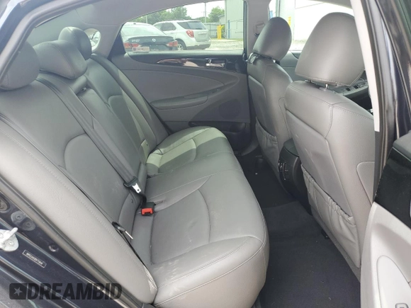 2013 Hyundai Sonata Limited z VIN 5NPEC4AC6DH711644, wystawiony jako Copart lot #61027705 z przebiegiem 65 443 mil mil oraz Szkoda całkowita • Salvage title. Historia ofert i sprzedaży dostępna na DreamBid. Obrazek 10.