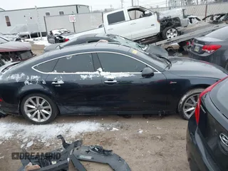 2016 Audi A7 3.0 Premium Plus with VIN WAUWGAFC0GN006470, listed as a IAAI auction lot 41638615 with 104,040 mi miles. Bid and sale history available at carsss.com. Image 13.