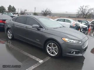 2015 Ford Fusion Energi Titanium with VIN 3FA6P0SU2FR173958, listed as a IAAI auction lot 41504220 with 170,235 mi miles. Bid and sale history available at carsss.com. Image 1.
