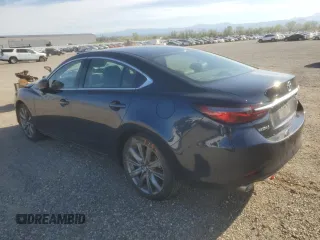 2019 Mazda 6 Touring with VIN JM1GL1VM5K1502586, listed as a Copart auction lot 50774985 with 70,088 mi miles and Salvage Title. Bid and sale history available at carsss.com. Image 2.