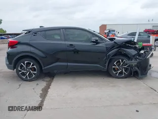 2020 Toyota C-HR LE z VIN JTNKHMBX1L1074377, wystawiony jako IAAI lot #42135672 z przebiegiem 88 846 mil mil oraz . Historia ofert i sprzedaży dostępna na DreamBid. Obrazek 13.