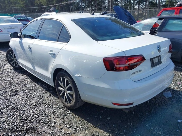 2017 Volkswagen Jetta 1.4T SE with VIN 3VWDB7AJXHM325773, listed as a IAAI auction lot 41691782 with 172,273 mi miles. Bid and sale history available at carsss.com. Image 3.