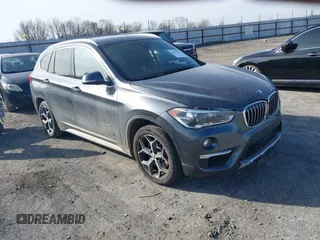 2016 BMW X1 xDrive28i with VIN WBXHT3Z39G4A49795, listed as a IAAI auction lot 41454465 with 55,500 mi miles. Bid and sale history available at carsss.com. Image 1.