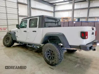 2023 Jeep Gladiator Sport S with VIN 1C6HJTAG1PL542530, listed as a Copart auction lot 60669075 with 44,323 mi miles and Salvage title. Bid and sale history available at DreamBid. Image 3.