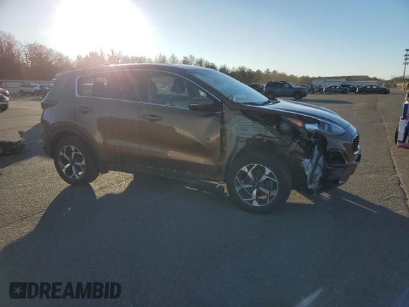 2020 Kia Sportage LX with VIN KNDPMCAC7L7650310, listed as a Copart auction lot 87936345 with 56,614 mi miles and Non Repairable. Bid and sale history available at carsss.com. Image 4.