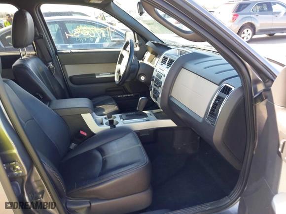 2011 Mercury Mariner with VIN 4M2CN9BG5BKJ03462, listed as a IAAI auction lot 41770084 with 120,508 mi miles. Bid and sale history available at carsss.com. Image 5.