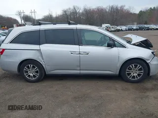 2013 Honda Odyssey EX-L with VIN 5FNRL5H65DB050789, listed as a IAAI auction lot 41911537 with 160,348 mi miles and . Bid and sale history available at carsss.com. Image 13.