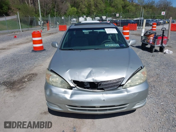 2004 Toyota Camry LE with VIN 4T1BE30K14U290983, listed as a IAAI auction lot 41983078 with 174,852 mi miles and . Bid and sale history available at carsss.com. Image 12.