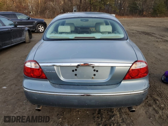 2005 Jaguar S-Type z VIN SAJWA01T45FN51425, wystawiony jako Copart lot #86682684 z przebiegiem 53 218 mil mil oraz Czysty tytuł • Clean title. Historia ofert i sprzedaży dostępna na DreamBid. Obrazek 6.