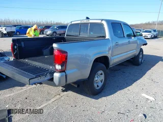 2023 Toyota Tacoma 4WD SR with VIN 3TMCZ5AN2PM638929, listed as a IAAI auction lot 41860423 with 12,246 mi miles. Bid and sale history available at carsss.com. Image 4.