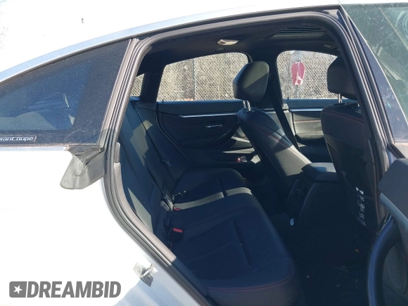 2016 BMW 4 Series 428i xDrive with VIN WBA4C9C59GG138090, listed as a IAAI auction lot 41560267 with 94,010 mi miles and . Bid and sale history available at carsss.com. Image 8.