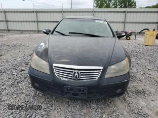 2006 Acura RL z VIN JH4KB16586C010597, wystawiony jako Copart lot #53846535 z przebiegiem 212 219 mil mil oraz Szkody całkowita. Historia ofert i sprzedaży dostępna na DreamBid. Obrazek 5.