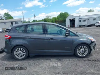 2018 Ford C-Max SE z VIN 1FADP5AU4JL101950, wystawiony jako IAAI lot #42289435 z przebiegiem 218 413 mil mil oraz . Historia ofert i sprzedaży dostępna na DreamBid. Obrazek 13.