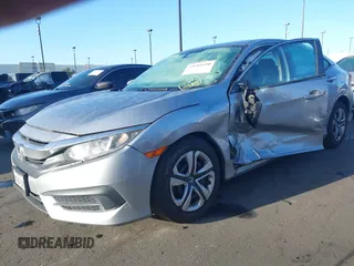 2018 Honda Civic LX with VIN 2HGFC2F58JH571072, listed as a IAAI auction lot 41684450 with 66,032 mi miles and . Bid and sale history available at carsss.com. Image 6.