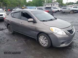 2013 Nissan Versa S with VIN 3N1CN7AP9DL861143, listed as a IAAI auction lot 42538137 with 249,439 mi miles and . Bid and sale history available at DreamBid. Image 1.
