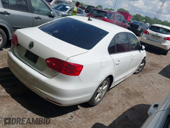 2013 Volkswagen Jetta TDI w/Premium/Nav with VIN 3VWLL7AJ9DM300544, listed as a IAAI auction lot 42401610 with 157,585 mi miles and . Bid and sale history available at DreamBid. Image 4.