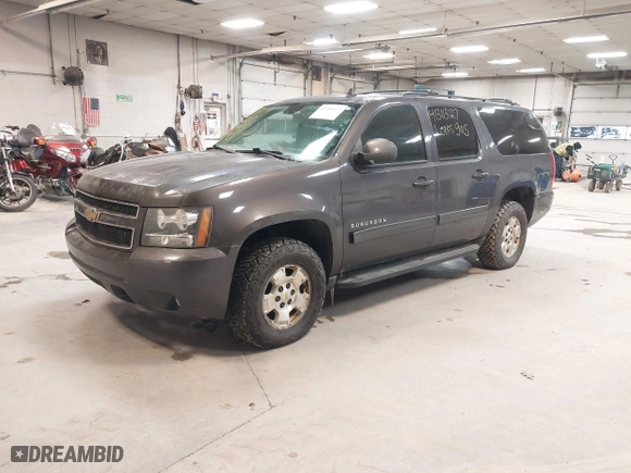 2010 Chevrolet Suburban LT with VIN 1GNUKJE36AR139025, listed as a IAAI auction lot 41311327 with 201,955 mi miles. Bid and sale history available at carsss.com. Image 2.
