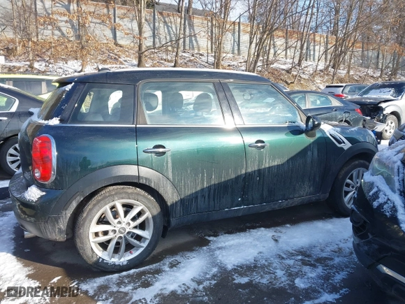 2013 MINI Cooper Countryman with VIN WMWZB3C53DWM08700, listed as a IAAI auction lot 41402093 with 71,109 mi miles. Bid and sale history available at carsss.com. Image 14.