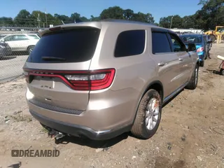 2014 Dodge Durango SXT with VIN 1C4RDHAG4EC266777, listed as a IAAI auction lot 42490301 with 210,544 mi miles and . Bid and sale history available at DreamBid. Image 4.