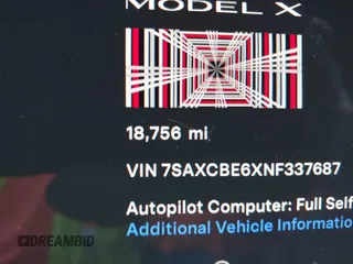 2022 Tesla Model X Plaid with VIN 7SAXCBE6XNF337687, listed as a IAAI auction lot 42035097 with 18,756 mi miles and . Bid and sale history available at DreamBid. Image 16.