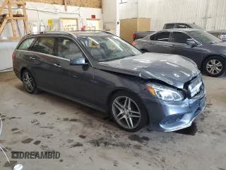 2015 Mercedes-Benz E 350 Luxury with VIN WDDHH8JB0FB134830, listed as a Copart auction lot 70855934 with 106,717 mi miles and Salvage title. Bid and sale history available at DreamBid. Image 4.