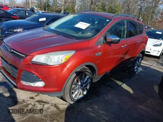 2014 Ford Escape SE with VIN 1FMCU9GX1EUE23044, listed as a IAAI auction lot 41597818 with 165,348 mi miles. Bid and sale history available at carsss.com. Image 2.