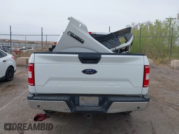 2018 Ford F-150 XL with VIN 1FTEW1E50JKE95093, listed as a IAAI auction lot 41944743 with 92,129 mi miles. Bid and sale history available at carsss.com. Image 17.