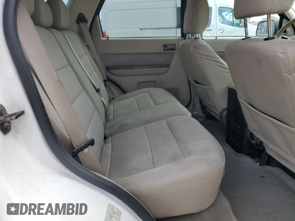 2010 Ford Escape Hybrid z VIN 1FMCU5K35AKC13081, wystawiony jako Copart lot #55447445 z przebiegiem 74 496 mil mil oraz Czysty tytuł • Clean title. Historia ofert i sprzedaży dostępna na DreamBid. Obrazek 11.