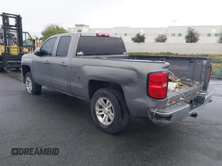 2017 Chevrolet Silverado 1500 LT with VIN 1GCRCRECXHZ159962, listed as a IAAI auction lot 41634689 with 145,978 mi miles and . Bid and sale history available at DreamBid. Image 3.