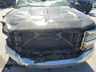 2016 Chevrolet Silverado 1500 LT with VIN 3GCUKREC0GG213703, listed as a Copart auction lot 47558925 with 126,015 mi miles and Salvage Title. Bid and sale history available at DreamBid. Image 12.
