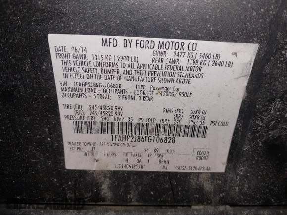 2015 Ford Taurus Limited with VIN 1FAHP2J86FG106828, listed as a IAAI auction lot 41748997 with 221,216 mi miles. Bid and sale history available at carsss.com. Image 9.