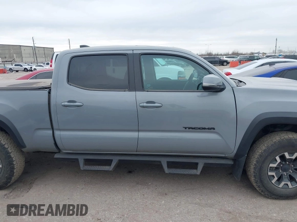 2021 Toyota Tacoma 4WD SR5 with VIN 3TMDZ5BN5MM116584, listed as a IAAI auction lot 41548175 with 23,031 mi miles. Bid and sale history available at carsss.com. Image 13.