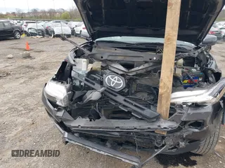 2018 Toyota Tacoma SR5 with VIN 3TMAZ5CN9JM070187, listed as a IAAI auction lot 41816520 with 43,068 mi miles and . Bid and sale history available at DreamBid. Image 6.