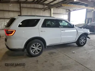 2014 Dodge Durango Limited z VIN 1C4RDJDG1EC593074, wystawiony jako Copart lot #64185525 z przebiegiem 125 203 mil mil oraz Szkoda całkowita • Salvage title. Historia ofert i sprzedaży dostępna na DreamBid. Obrazek 3.