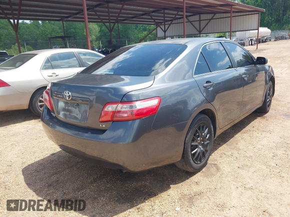 2009 Toyota Camry with VIN 4T1BE46K19U822477, listed as a IAAI auction lot 42052700 with 218,509 mi miles. Bid and sale history available at carsss.com. Image 4.