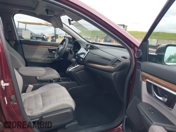 2019 Honda CR-V EX with VIN 7FARW2H56KE053022, listed as a IAAI auction lot 41848570 with 128,676 mi miles. Bid and sale history available at carsss.com. Image 5.
