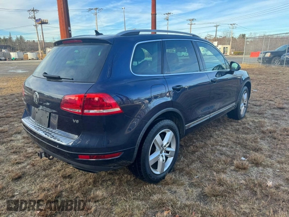 2012 Volkswagen Touareg Exec with VIN WVGEF9BP9CD006682, listed as a Copart auction lot 87463854 with 51,250 mi miles and Clean Title. Bid and sale history available at DreamBid. Image 4.