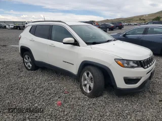 2019 Jeep Compass Latitude z VIN 3C4NJDBBXKT661517, wystawiony jako Copart lot #63339275 z przebiegiem 58 916 mil mil oraz Szkoda całkowita • Salvage title. Historia ofert i sprzedaży dostępna na DreamBid. Obrazek 4.