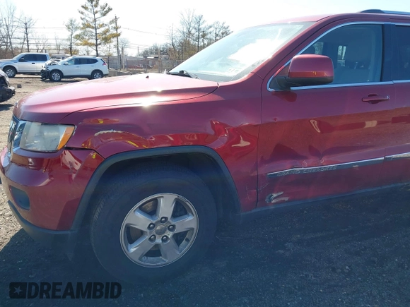 2012 Jeep Grand Cherokee Laredo with VIN 1C4RJFAG7CC297757, listed as a IAAI auction lot 41901645 with 270,731 mi miles. Bid and sale history available at carsss.com. Image 6.