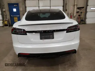 2023 Tesla Model S с VIN 5YJSA1E5XPF520265, выставлен на аукционе Copart как лот 54833255 с пробегом 16 502 миль миль и Списание • Salvage title. История ставок и продаж доступна на DreamBid. Изображение 6.