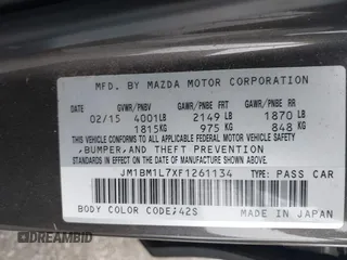 2015 Mazda 3 i Touring with VIN JM1BM1L7XF1261134, listed as a IAAI auction lot 42164554 with 130,570 mi miles and . Bid and sale history available at DreamBid. Image 9.