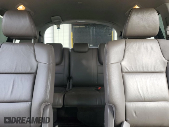 2012 Honda Odyssey EX-L with VIN 5FNRL5H60CB117376, listed as a Copart auction lot 50740725 with 163,716 mi miles and Salvage Title. Bid and sale history available at DreamBid. Image 10.