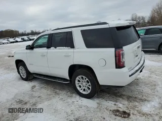 2020 GMC Yukon SLT with VIN 1GKS2BKC1LR280389, listed as a Copart auction lot 87928555 with 84,242 mi miles and Salvage Title. Bid and sale history available at carsss.com. Image 2.