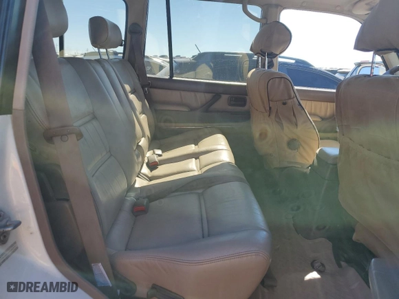 1997 Toyota Land Cruiser with VIN JT3HJ85J2V0180979, listed as a Copart auction lot 73216714 with 239,444 mi miles and Salvage Title. Bid and sale history available at carsss.com. Image 11.