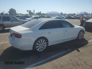 2018 Audi A8 z VIN WAU44AFD5JN000311, wystawiony jako Copart lot #72820344 z przebiegiem 70 140 mil mil oraz Szkoda całkowita • Salvage title. Historia ofert i sprzedaży dostępna na DreamBid. Obrazek 3.