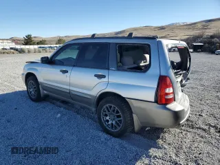 2003 Subaru Forester XS with VIN JF1SG65603G741030, listed as a Copart auction lot 46109315 with 154,469 mi miles and Salvage title. Bid and sale history available at DreamBid. Image 2.