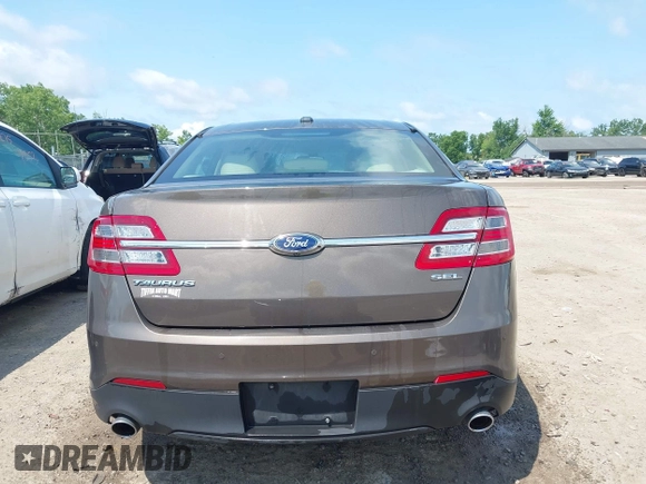 2015 Ford Taurus SEL with VIN 1FAHP2E82FG201994, listed as a IAAI auction lot 42750171 with 228,873 mi miles and . Bid and sale history available at DreamBid. Image 16.
