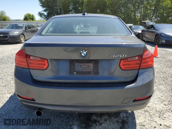 2014 BMW 3 Series 320i with VIN WBA3B1C54EK132952, listed as a Copart auction lot 63653435 with 63,260 mi miles and Salvage title. Bid and sale history available at DreamBid. Image 6.