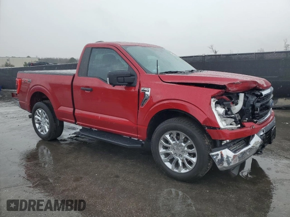 2021 Ford F-150 XL with VIN 1FTMF1E56MKE11052, listed as a Copart auction lot 46273985 with 31,100 mi miles and Salvage title. Bid and sale history available at DreamBid. Image 4.